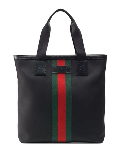 black canvas gucci tote.